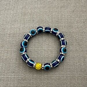 Evil Eye Beaded Bracelet with Blue and Yellow Accents